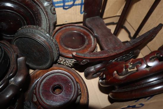 A group of Chinese wood stands including a dish stand